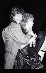 Mick Jagger w_ Ronnie Wood__s wife, Josephine  1982  NYC.jpg